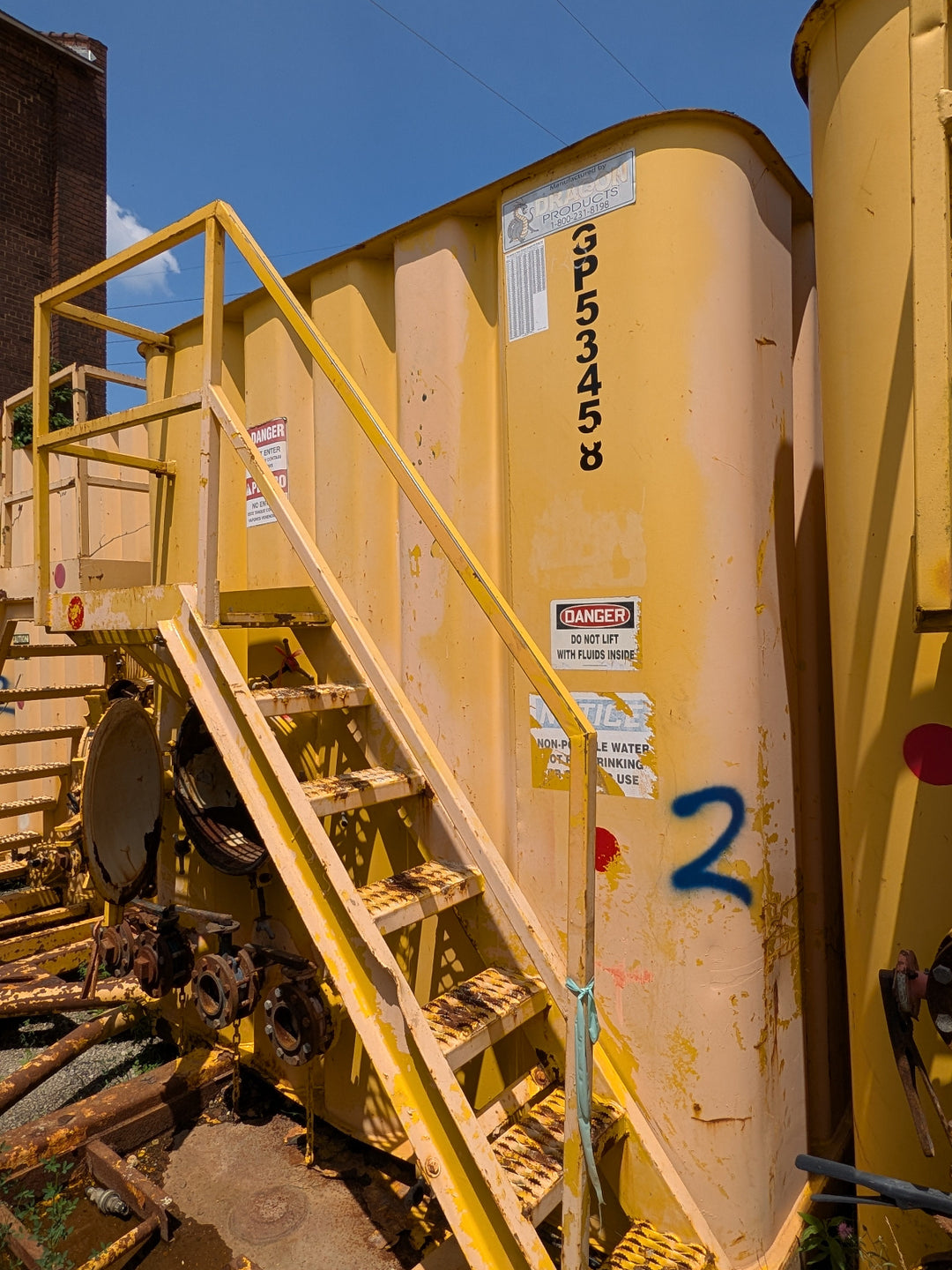 Front of yellow Dragon frac tank #GP53458