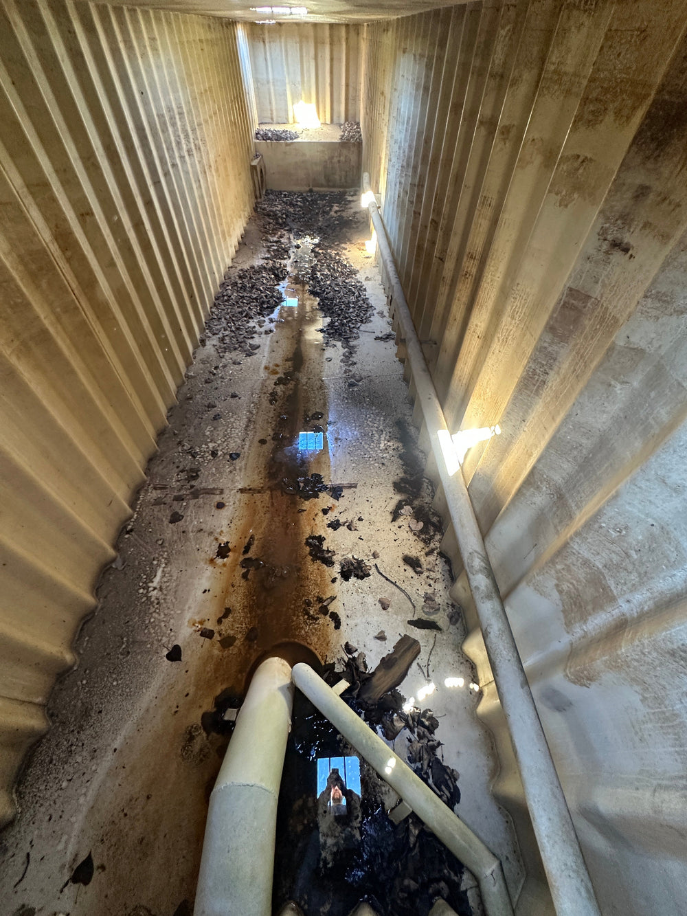 The interior of yellow Wichita 21,000 gallon frac tank #GP50178