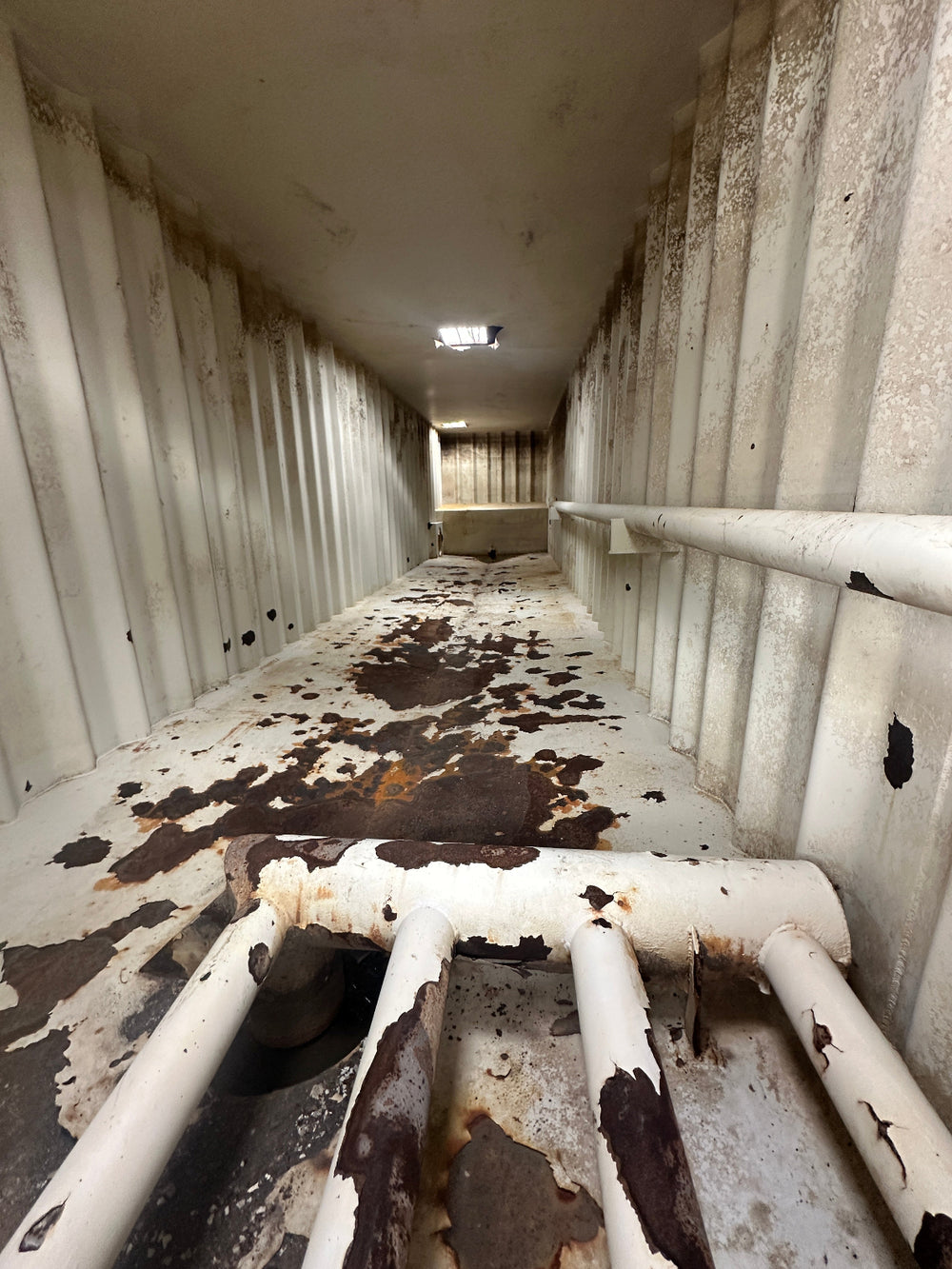 The interior of yellow Wichita 21,000 gallon frac tank #GP50214