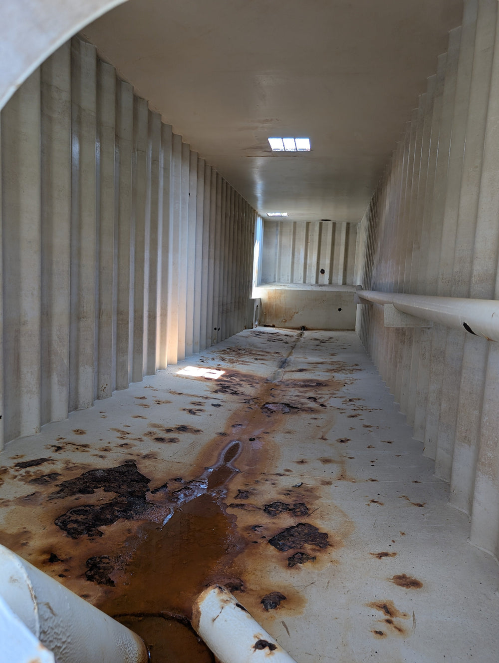 Interior of yellow Wichita frac tank GP50189