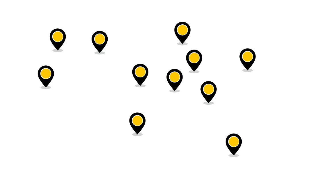 White map of the United States with yellow pins set around the country