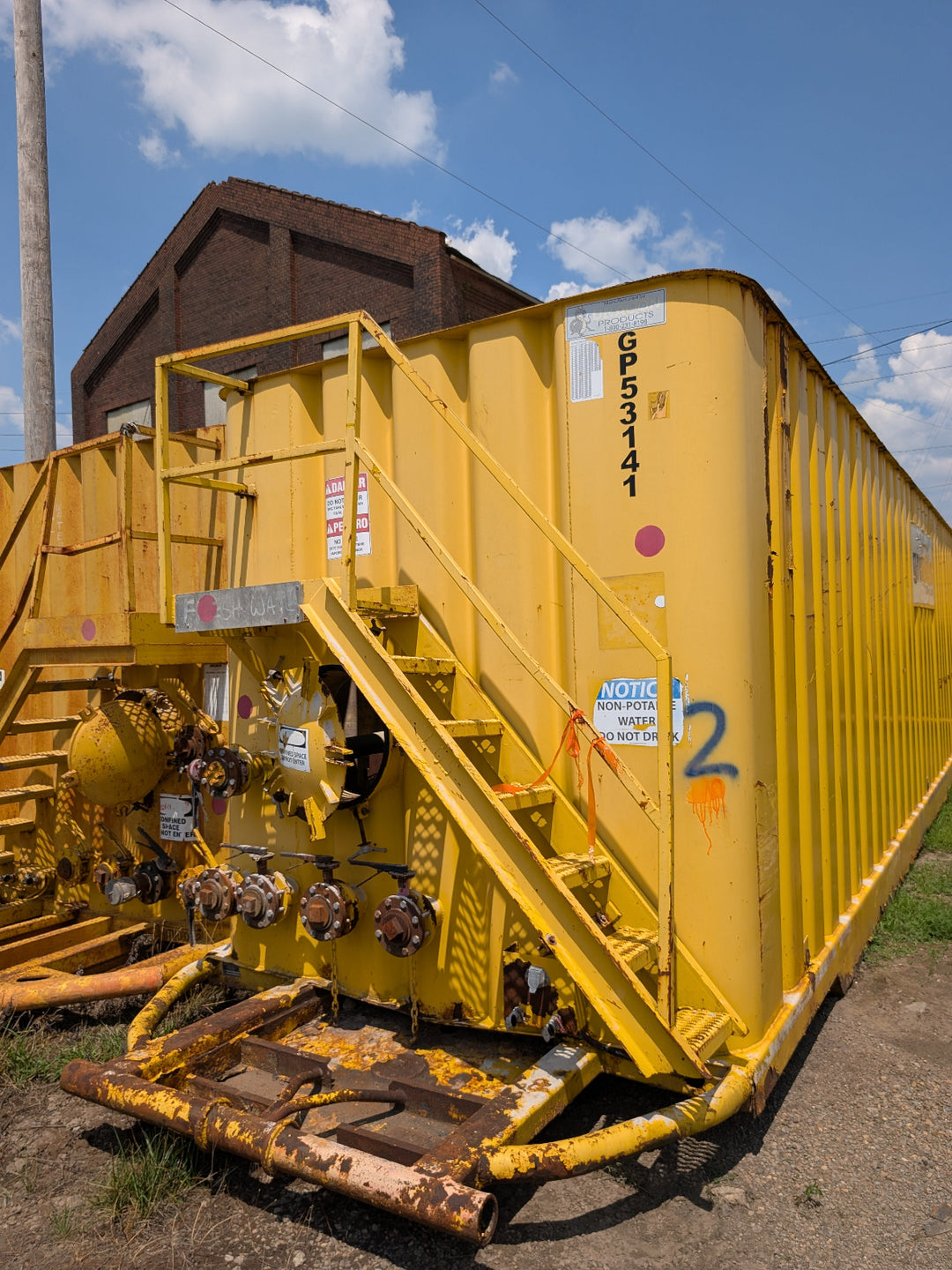 Front of yellow Dragon frac tank #GP53141