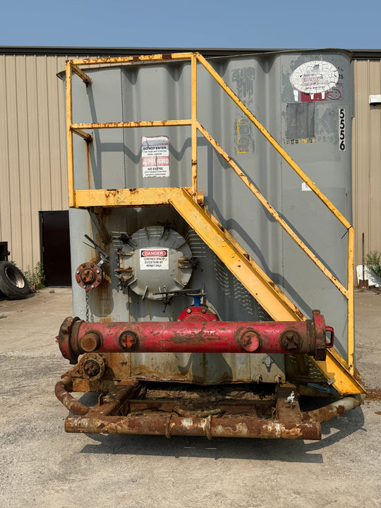 Front of gray Dragon flat top frac tank #5556