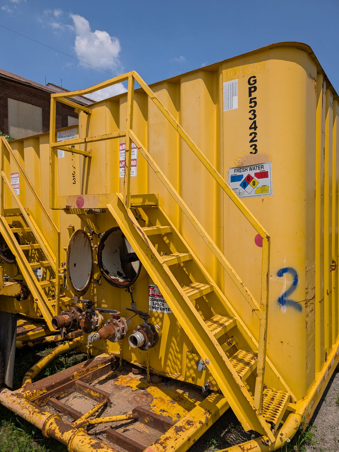 Front of yellow Dragon frac tank #GP53423