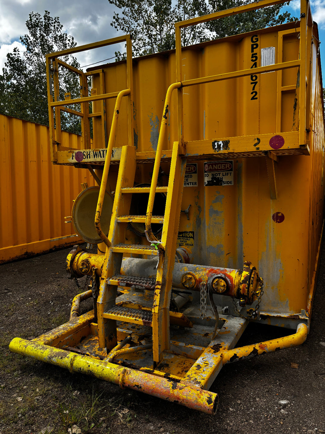 Front of yellow Dragon frac tank #GP54672