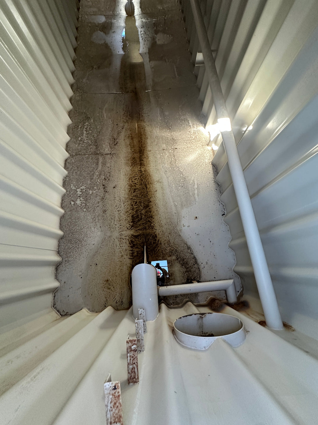 The interior (2) of yellow Wichita 21,000 gallon frac tank #GP50057
