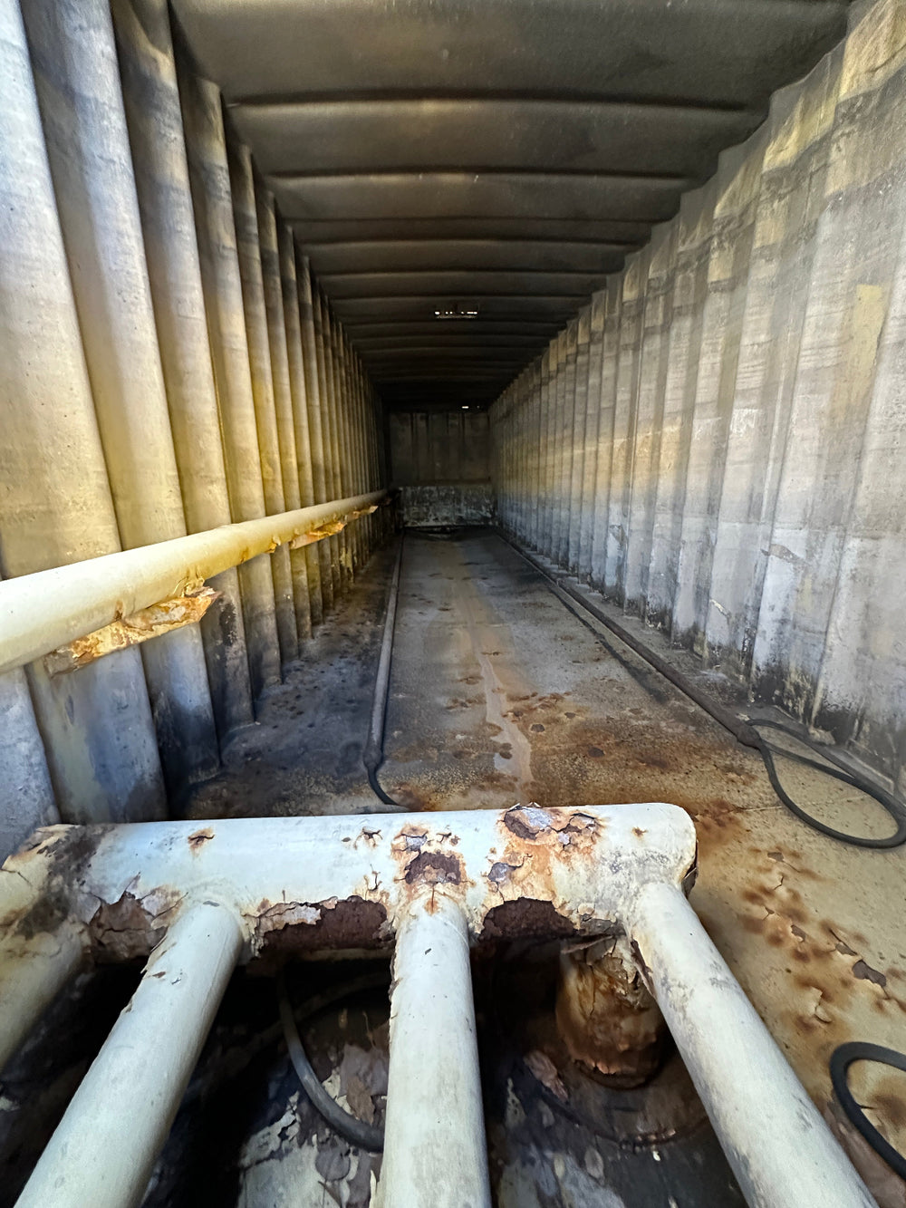 The interior of yellow Wichita 21,000 gallon frac tank #GP53141