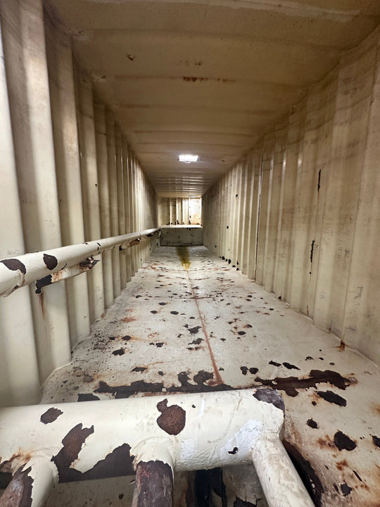 The interior of yellow Dragon 21,000 gallon frac tank #GP53235