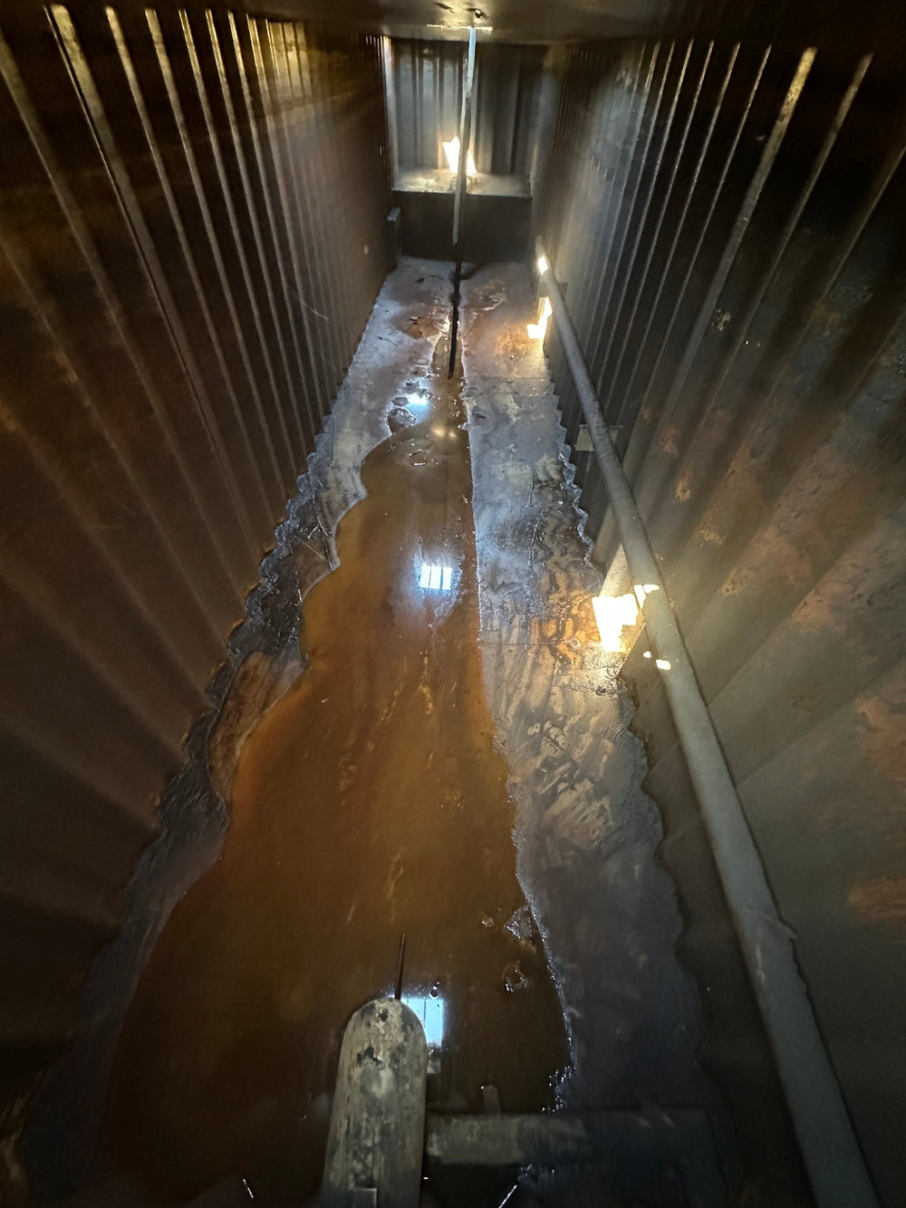 The interior of yellow Dragon 21,000 gallon frac tank #GP50042