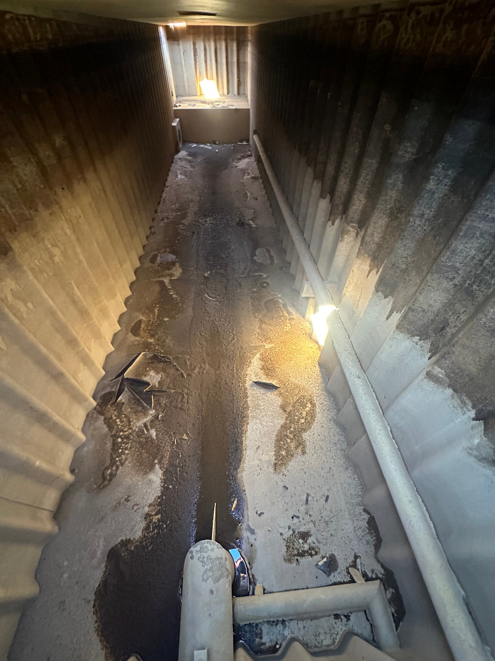 The interior of yellow Wichita 21,000 gallon frac tank #GP50001