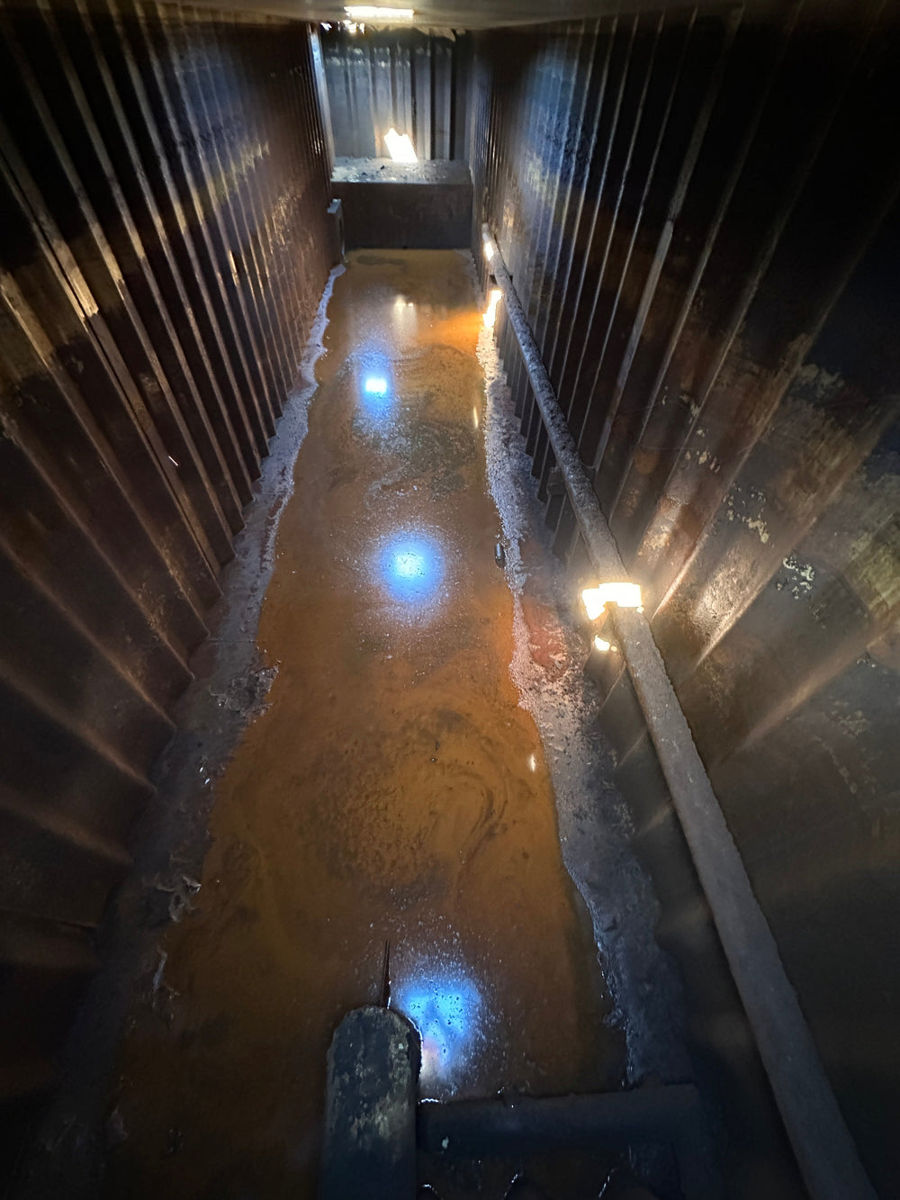 The interior of yellow Wichita 21,000 gallon frac tank #GP50044