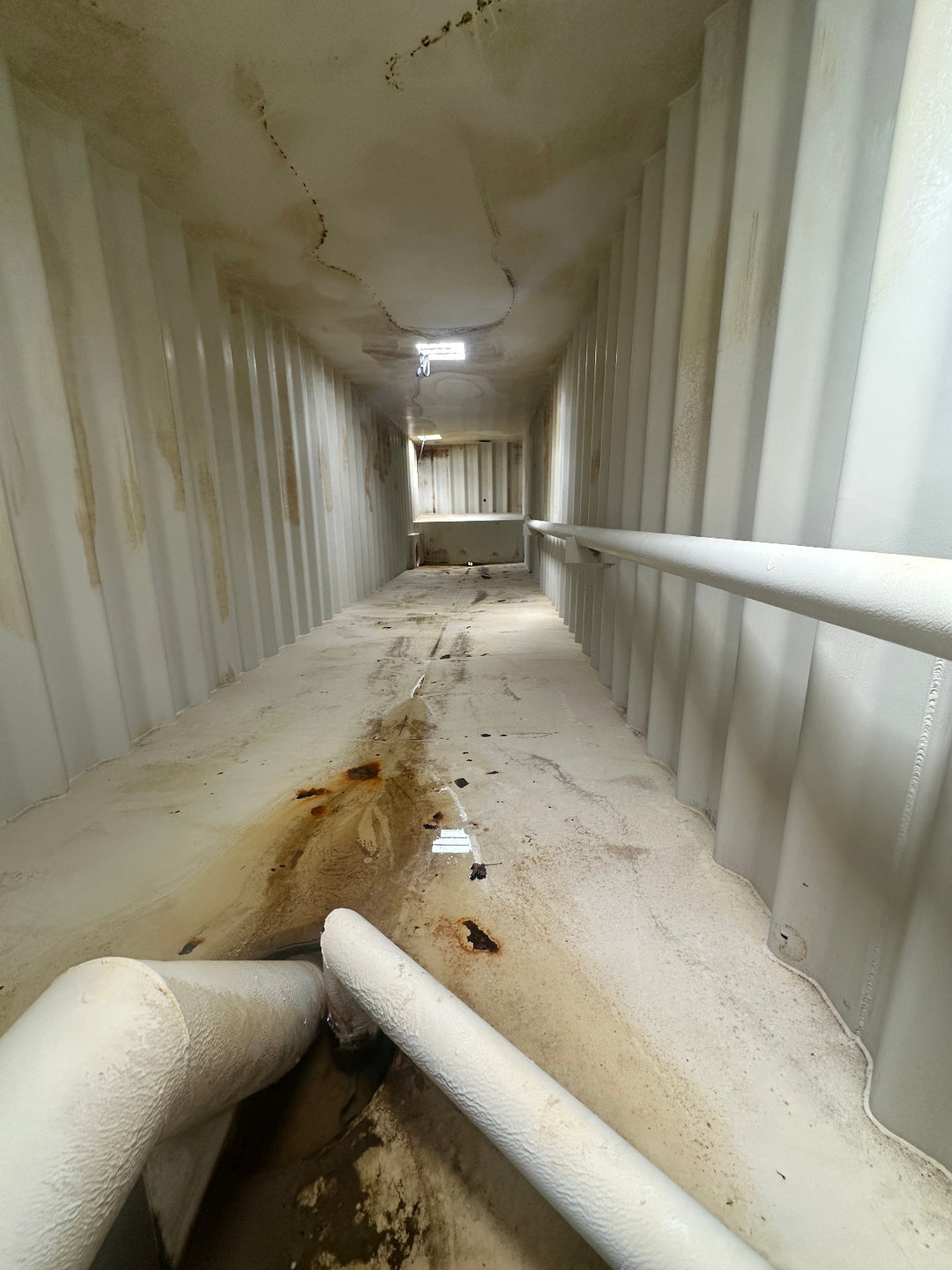 The interior of yellow Wichita 21,000 gallon frac tank #GP50115