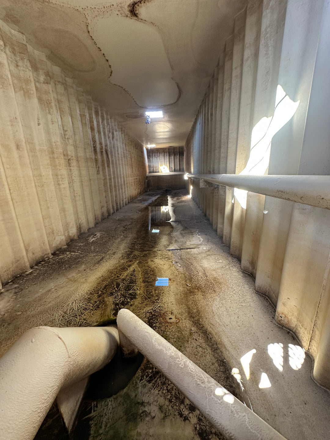 The interior of yellow Wichita 21,000 gallon frac tank #GP50116