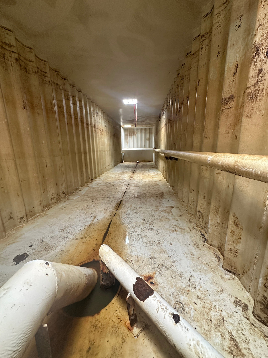 The interior of yellow Wichita 21,000 gallon frac tank #GP50146