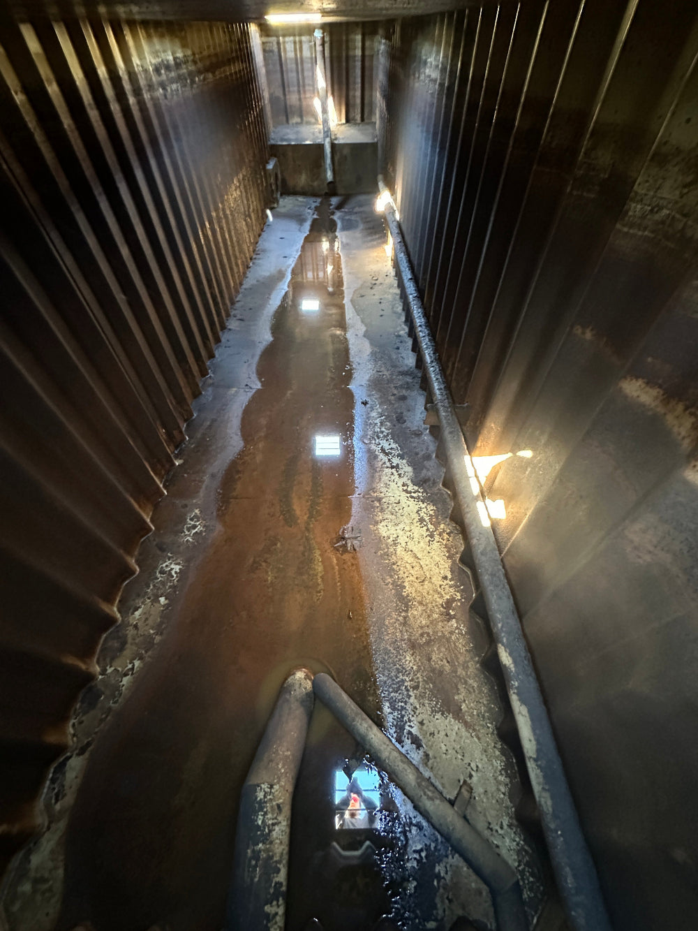 The interior of yellow Wichita 21,000 gallon frac tank #GP50162