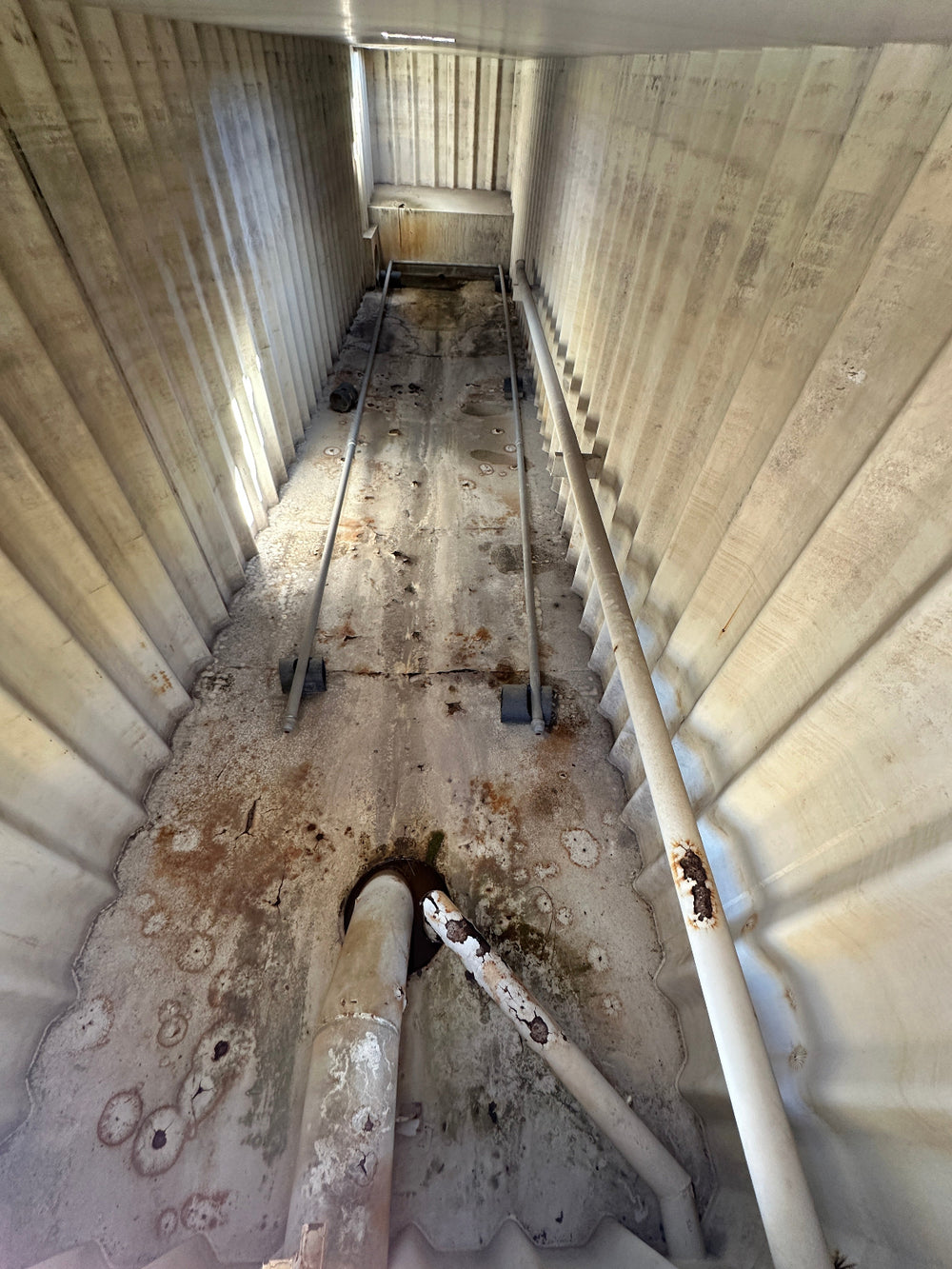 The interior of yellow Wichita 21,000 gallon frac tank #GP50172