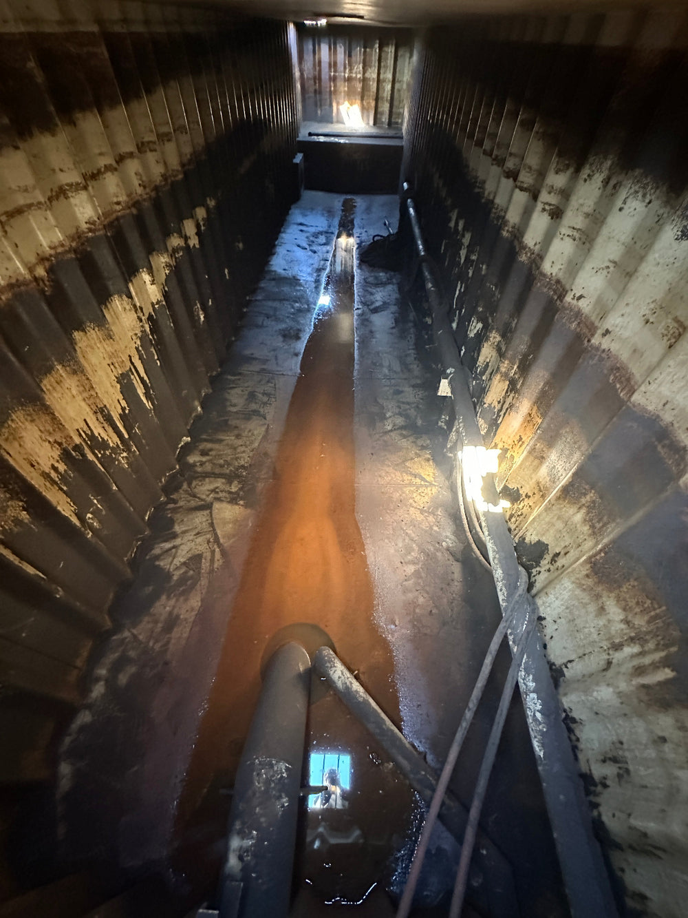 The interior of yellow Wichita 21,000 gallon frac tank #GP50194