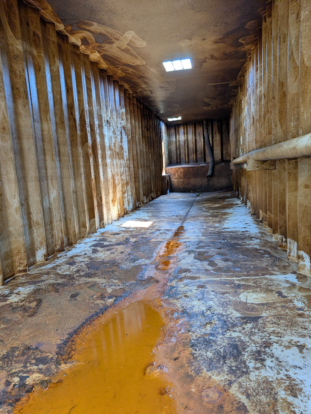 Interior of yellow Wichita flat top frac tank #GP50112
