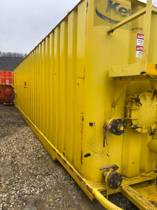 View of the left side of the yellow Dragon 21,000 gallon frac tank #0760568