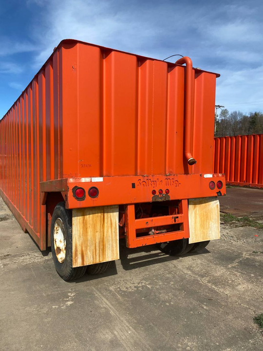 Rear view of the red Salty's 21,000 gallon frac tank #28636