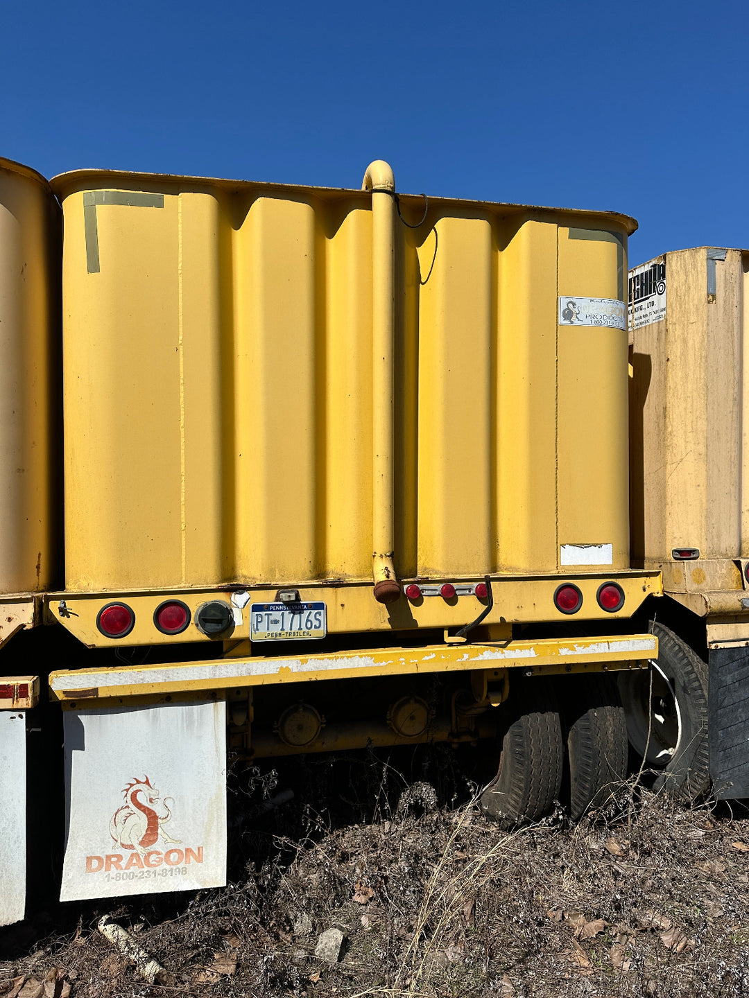 Rear view of the yellow Dragon 21,000 gallon frac tank #GP53196