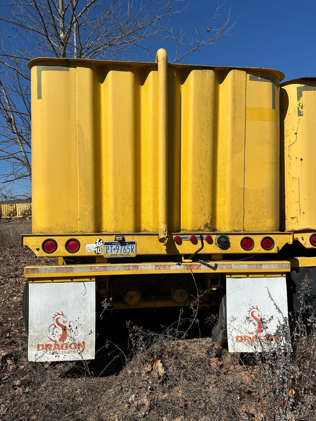 Rear view of the yellow Dragon 21,000 gallon frac tank #GP53203