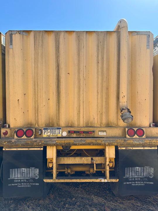 Rear view of the yellow Wichita 21,000 gallon frac tank #GP50044