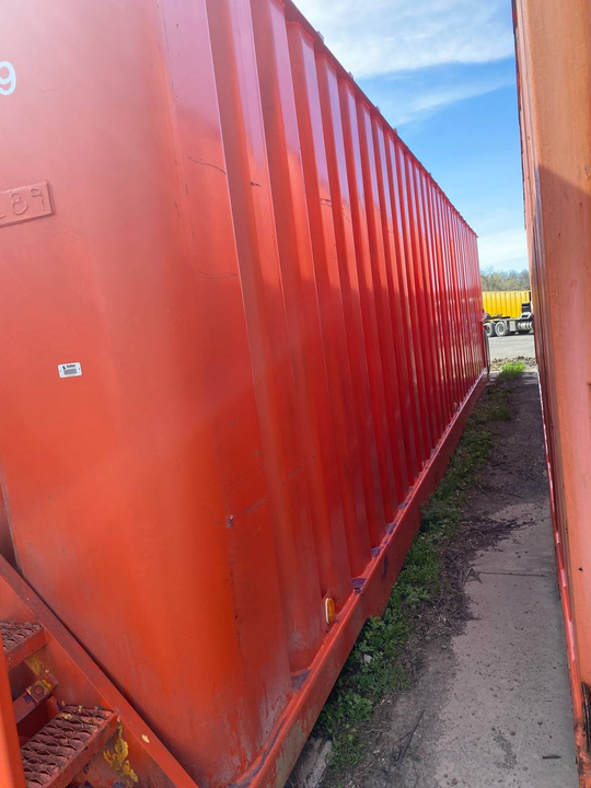 View of the right side of the red Dragon 21,000 gallon frac tank #26982